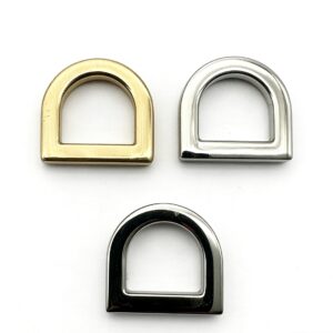 High-end chunky solid D-rings in light gold, mirror silver, and glossy gunmetal finishes for heavy-duty luxury bags, custom OEM manufactured by Wahkoi Metal.