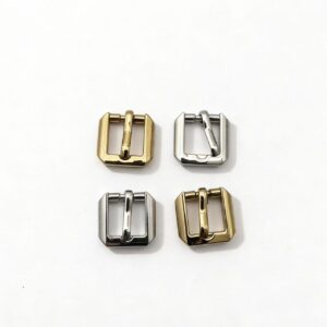 High-end light gold and mirror silver geometric beveled edge pin buckles and strap adjusters for luxury leather bags, custom OEM manufactured by Wahkoi Metal.