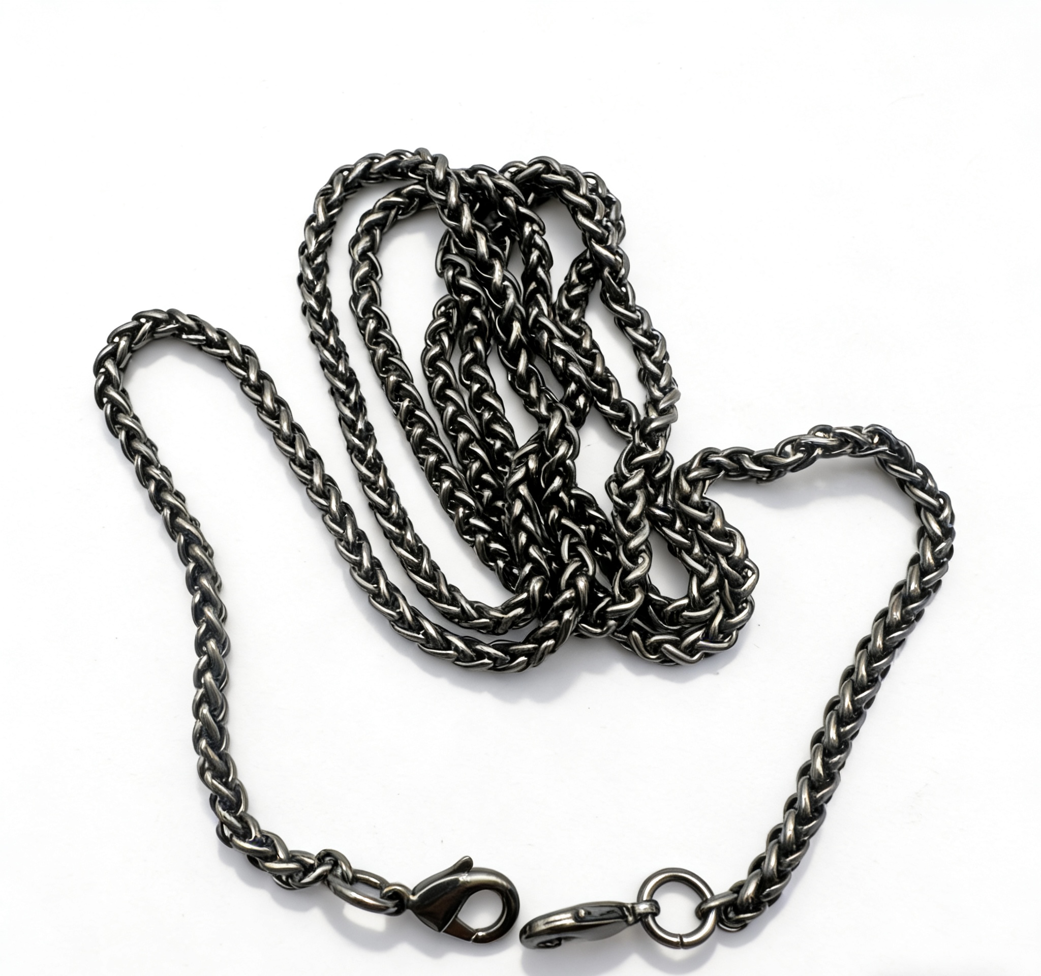 High-end gunmetal woven wheat chain for crossbody bags and heavy-duty wallet chains, custom OEM manufactured by Wahkoi Metal.