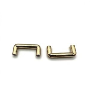 High-end mirror-polished light gold arched bridge connector and strap anchor for luxury handbags, custom OEM manufactured by Wahkoi Metal.