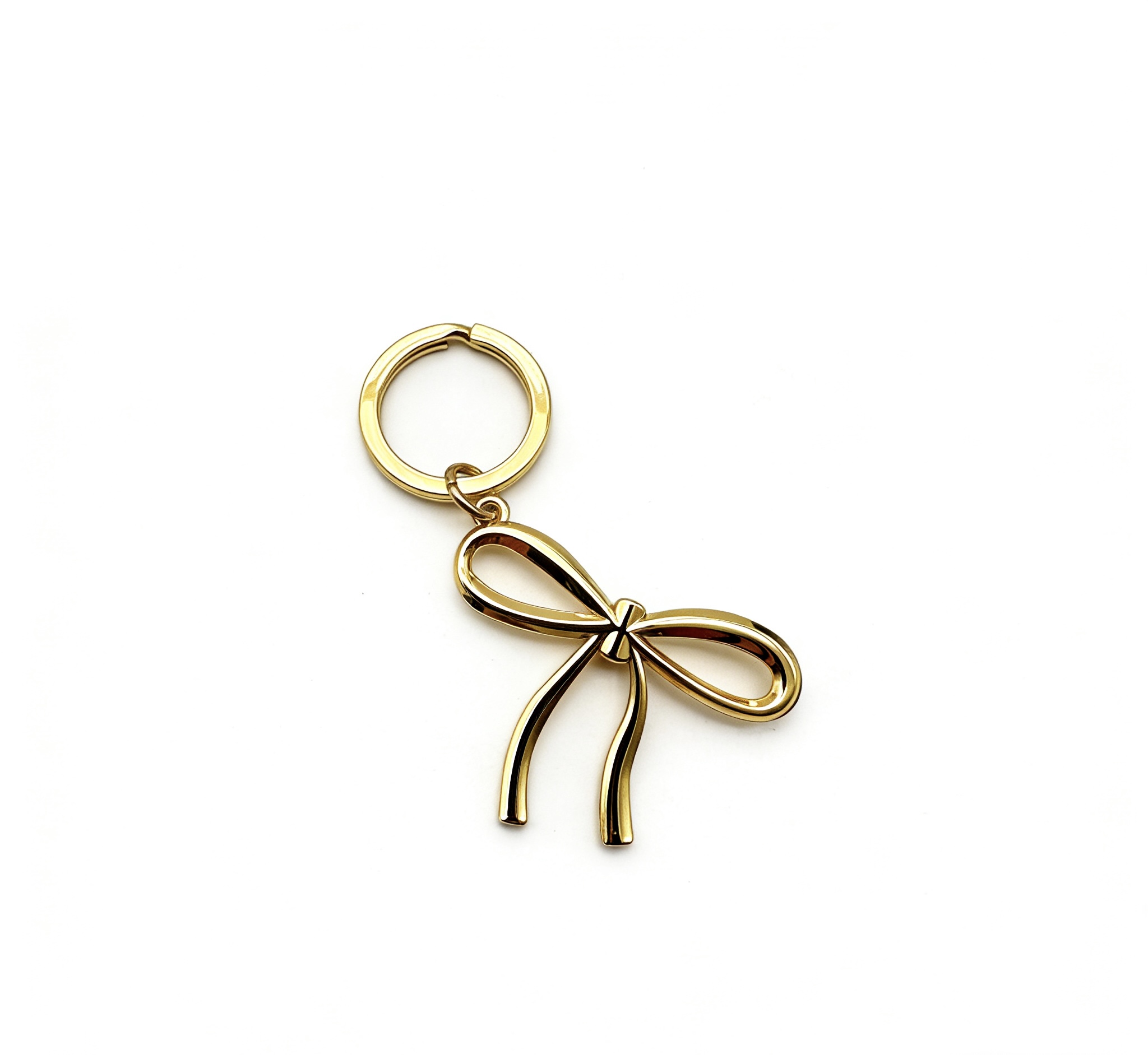 High-end mirror-polished light gold bowknot keychain and ribbon bag charm, custom OEM manufactured by Wahkoi Metal.