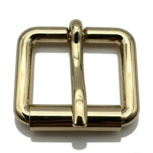 High-end mirror-polished light gold round and square pin buckles for luxury handbag straps and belts, custom OEM hardware by Wahkoi Metal.
