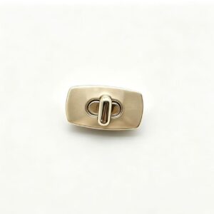 Premium brushed gold zinc alloy rectangular turn lock for luxury handbags, custom manufactured by Wahkoi Metal.