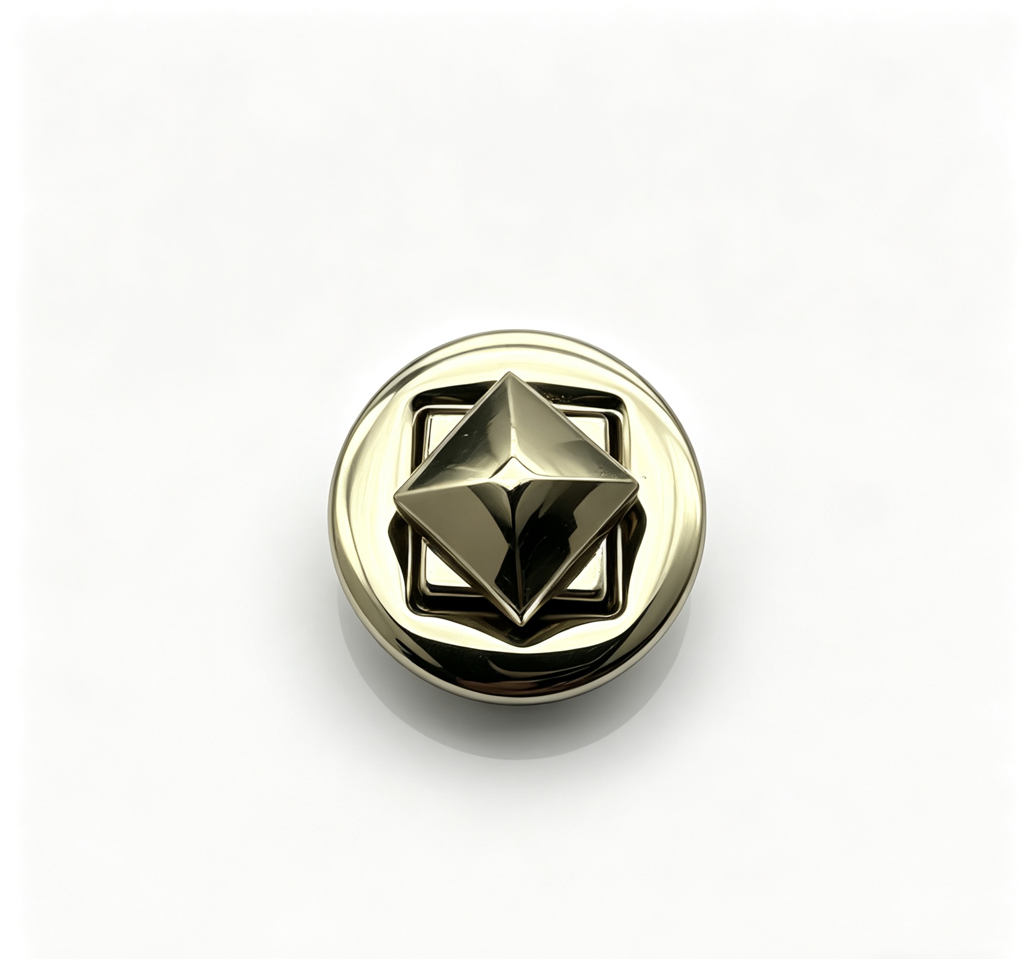 Close-up of a high-polish light gold round twist lock featuring a 3D pyramid stud turn mechanism for luxury handbags, custom manufactured by Wahkoi Metal