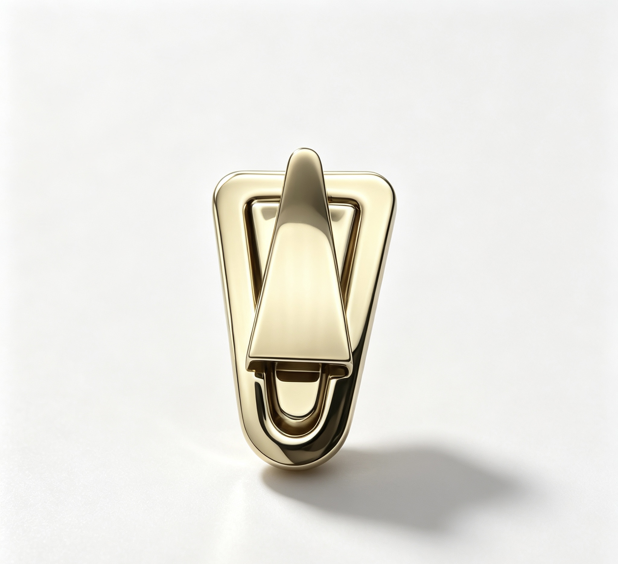 Close-up of a high-polish light gold triangle shield twist lock featuring a modern geometric design for luxury handbags, custom manufactured by Wahkoi Metal