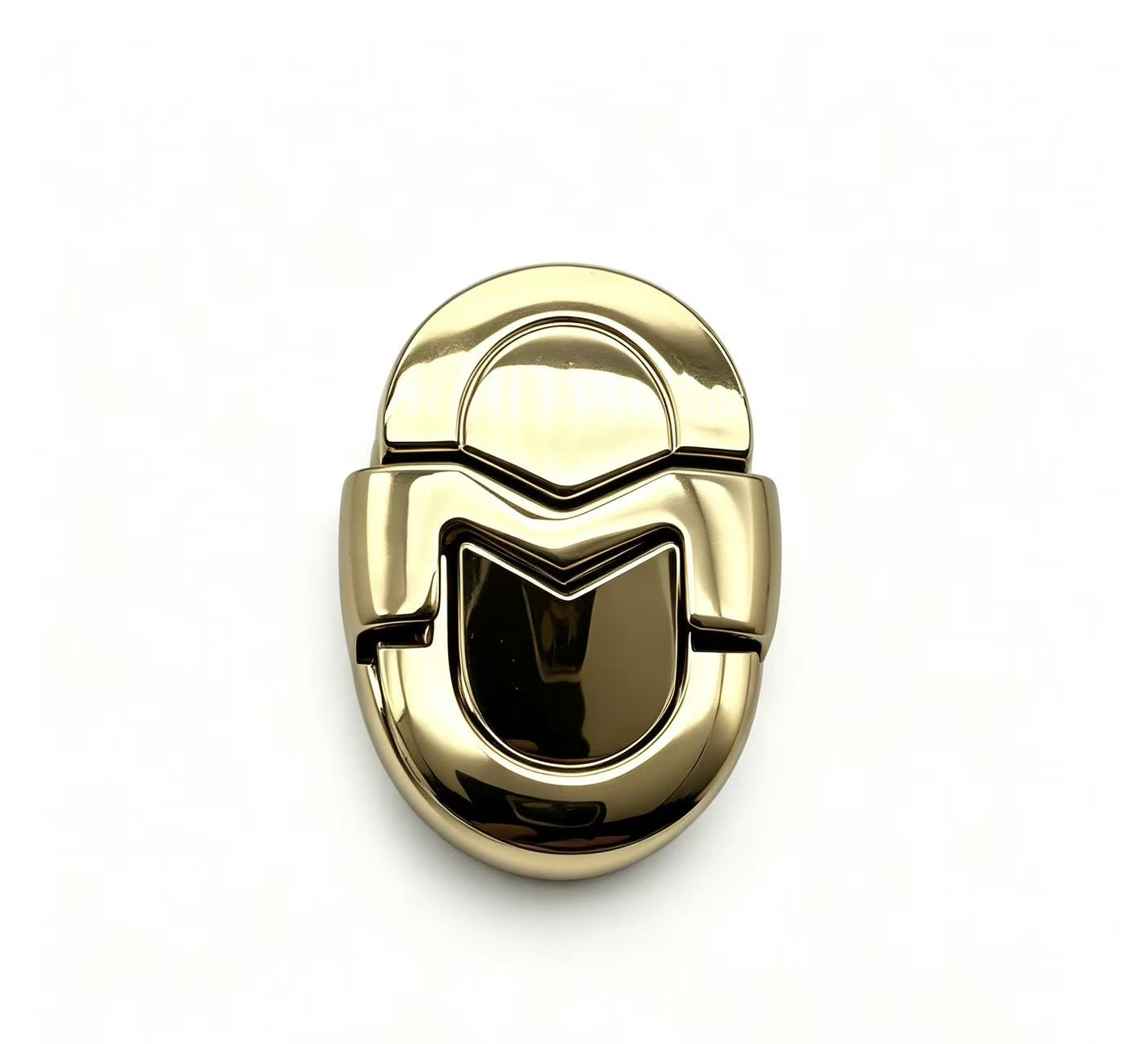 Premium polished gold zinc alloy oval handbag lock with M-shaped clasp, custom manufactured by Wahkoi Metal.