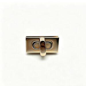 Premium polished gold zinc alloy rectangular turn lock for luxury handbags, custom manufactured by Wahkoi Metal.