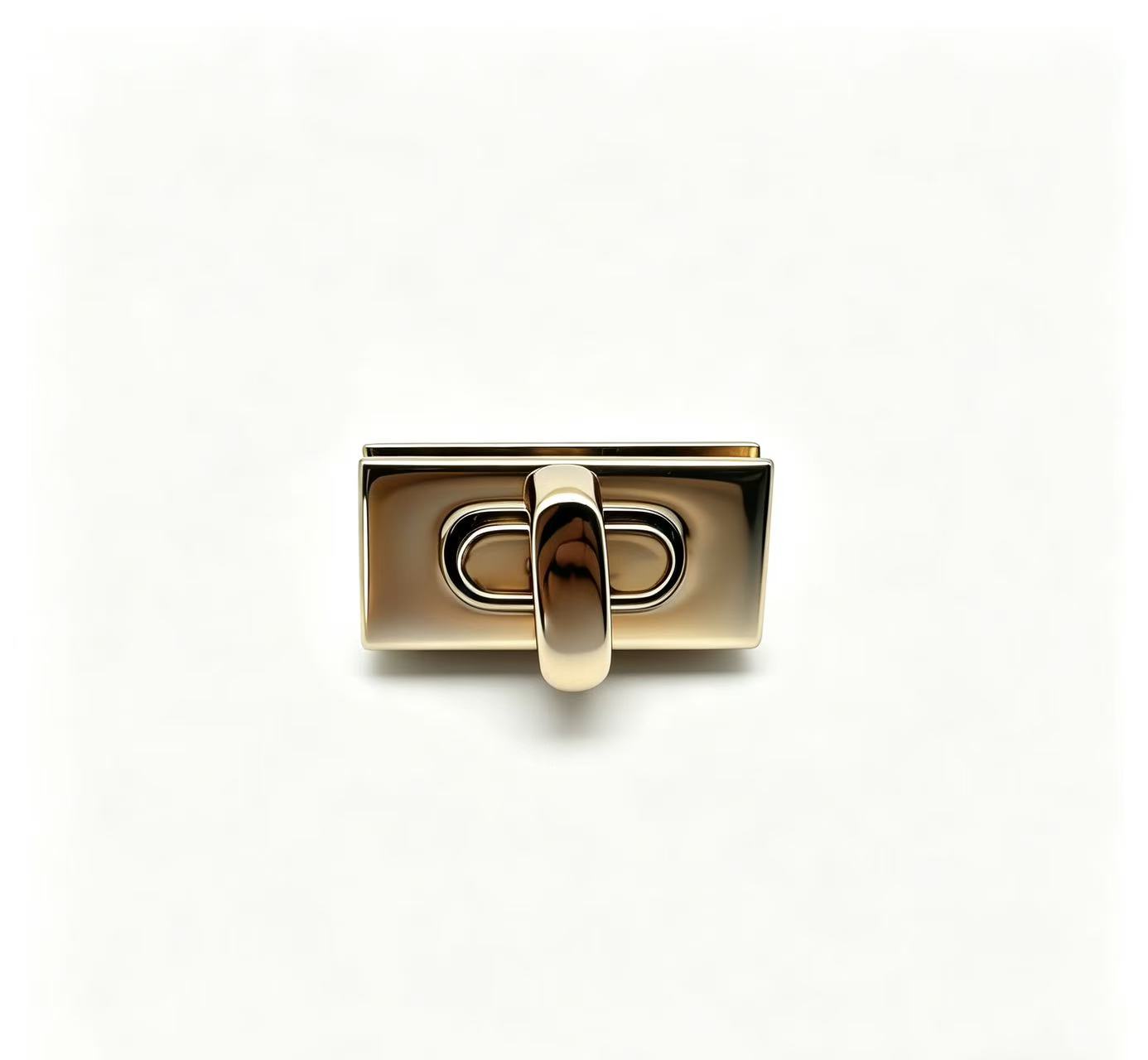 Premium polished gold zinc alloy rectangular turn lock for luxury handbags, custom manufactured by Wahkoi Metal.