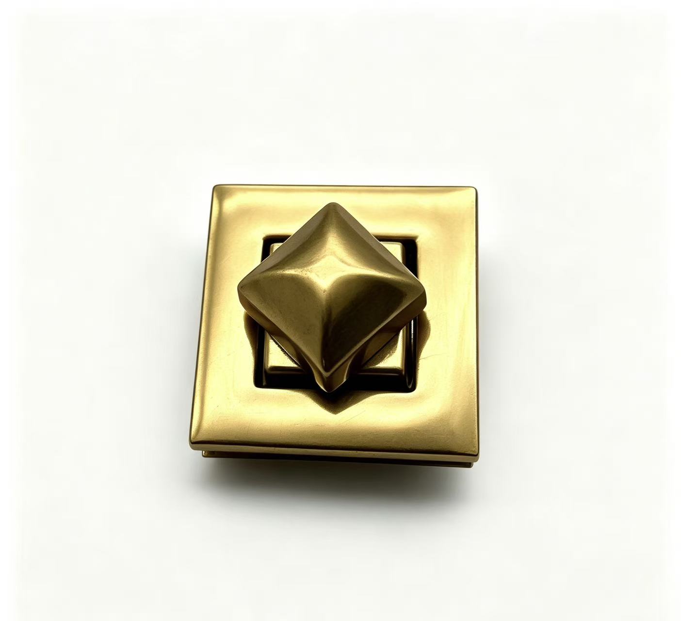 Premium square gold zinc alloy turn lock with pyramid twist knob for luxury handbags, custom manufactured by Wahkoi Metal.